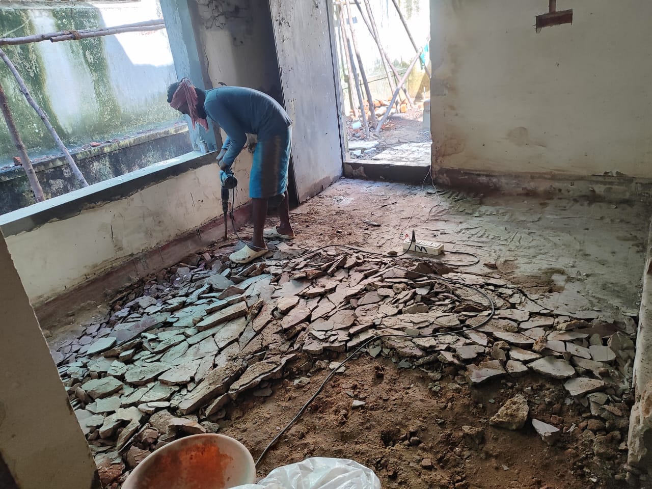 Bulldozer smoothing ground for new road construction